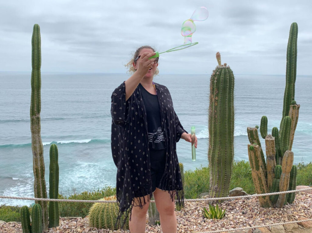 Author Jess making bubbles at meditation gardens