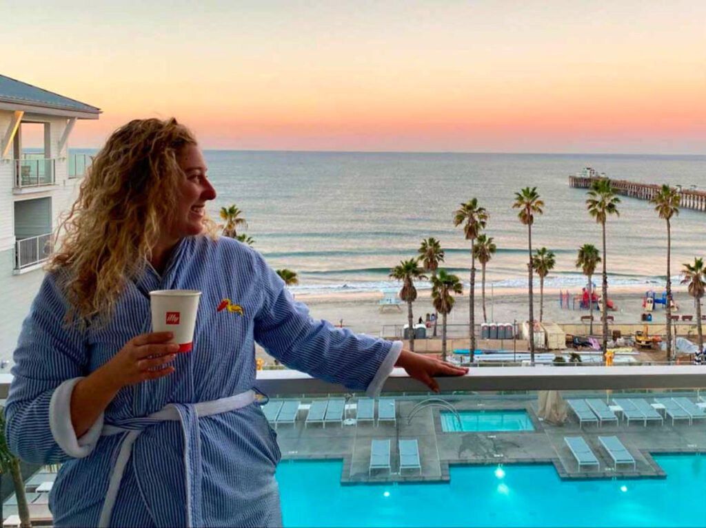 Author Jess enjoying the views at an oceanfront staycation in Oceanside