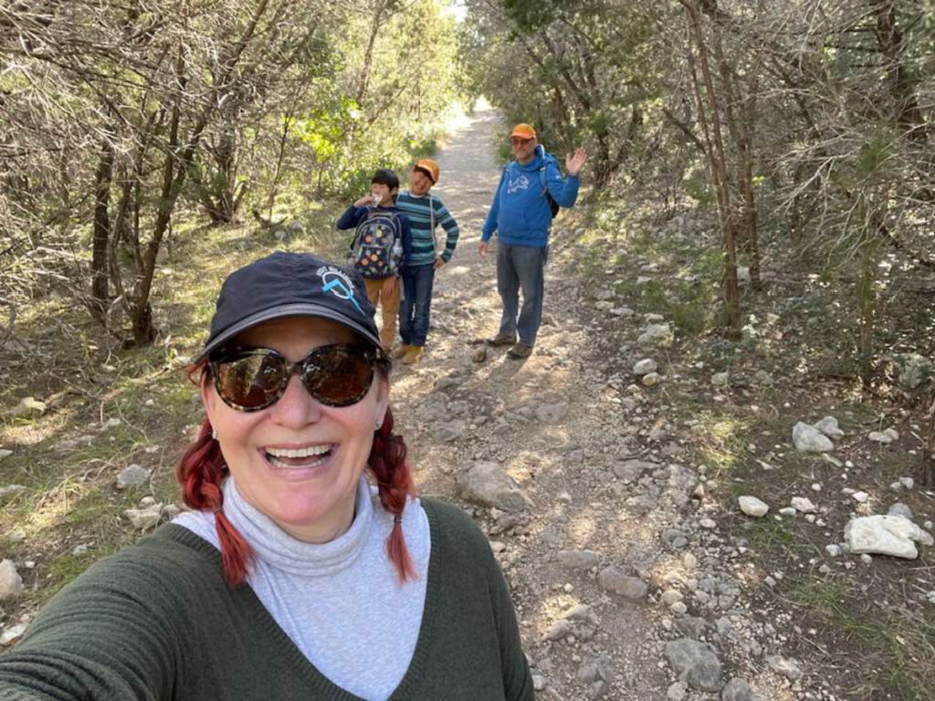 Author Jill and her family hiking the Joe Johnston Route to see the dinosaur tracks