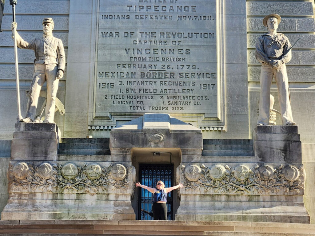 Author Kelsey standing in the middle of the Soldiers and Sailors Monument