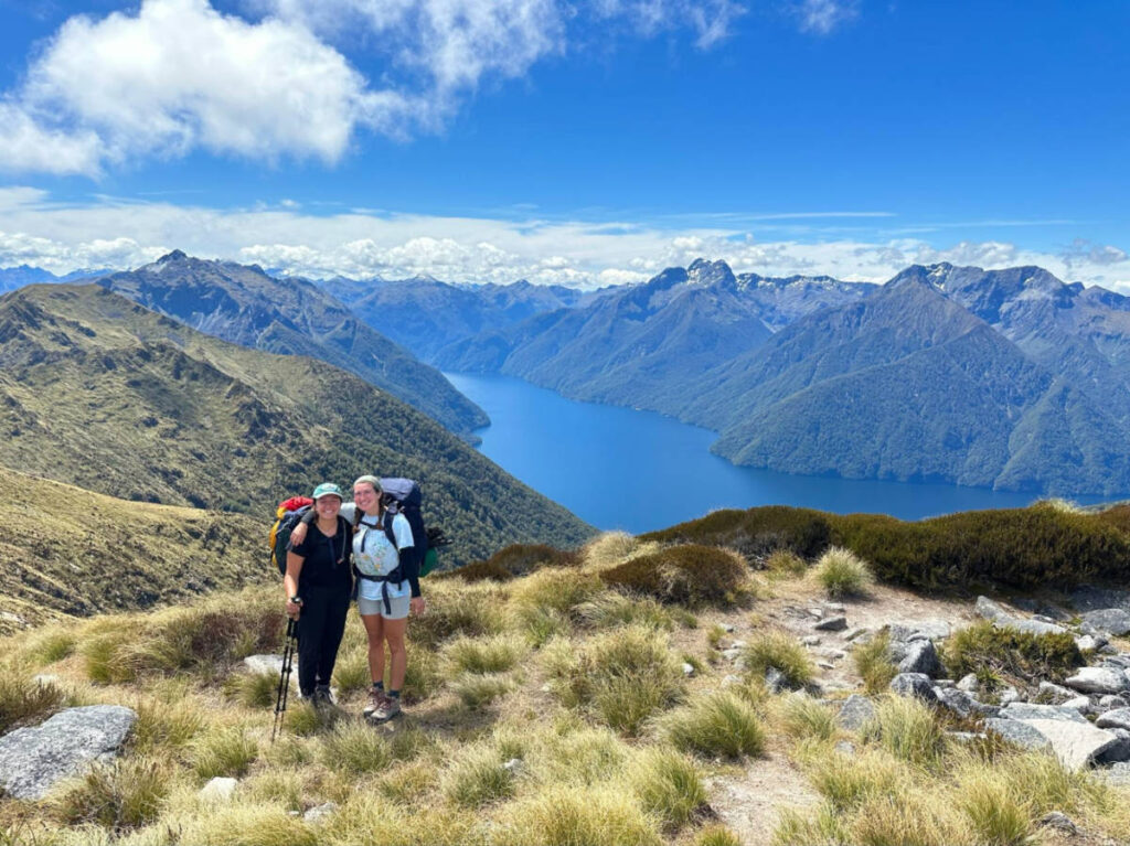 Author Laura and her partner hiking on the Kepler Trail