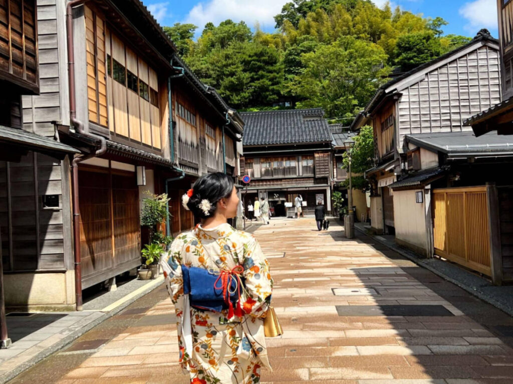 Author Lia walking around at Higashi Chaya while wearing a vintage kimono