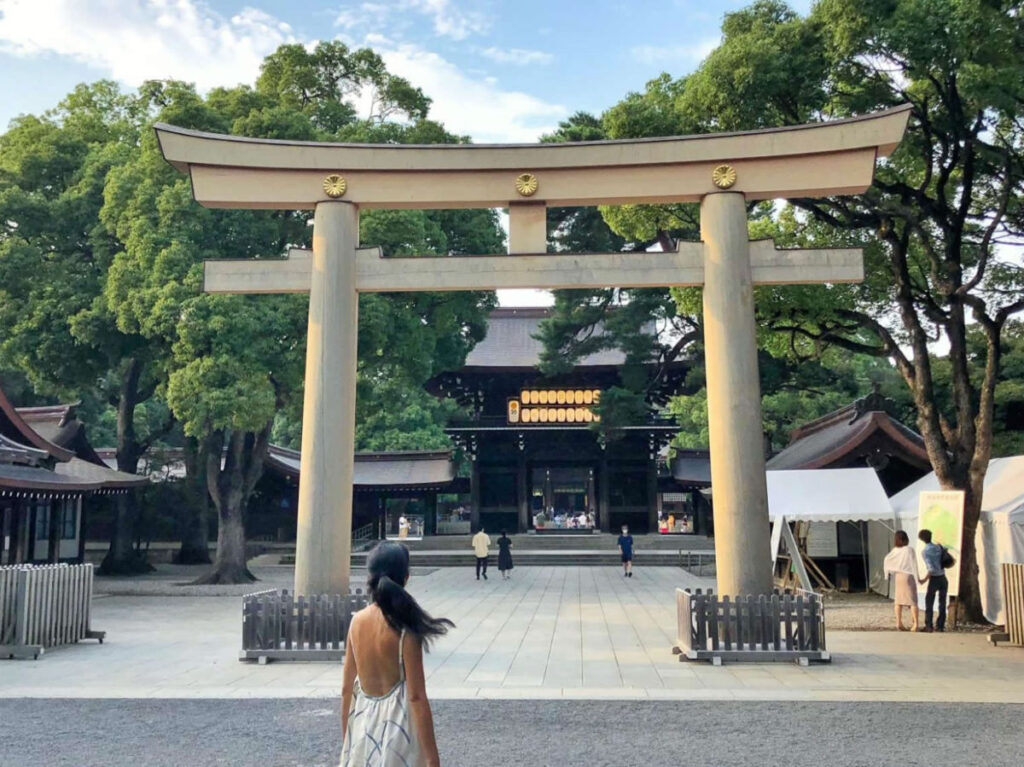 Author Lia standing in front of Meiji Jingu Shrine