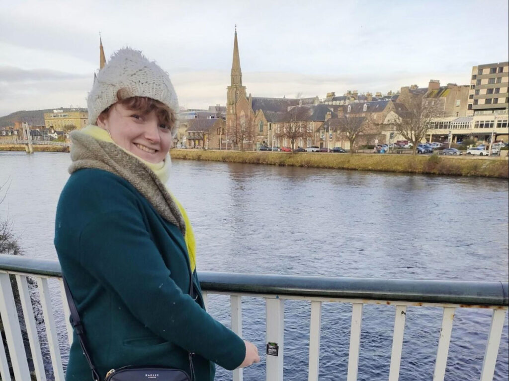 Author Louise standing near River Ness