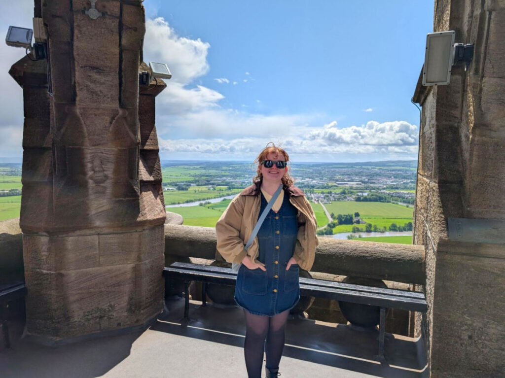 Author Louise standing at the top of the Wallace Monument