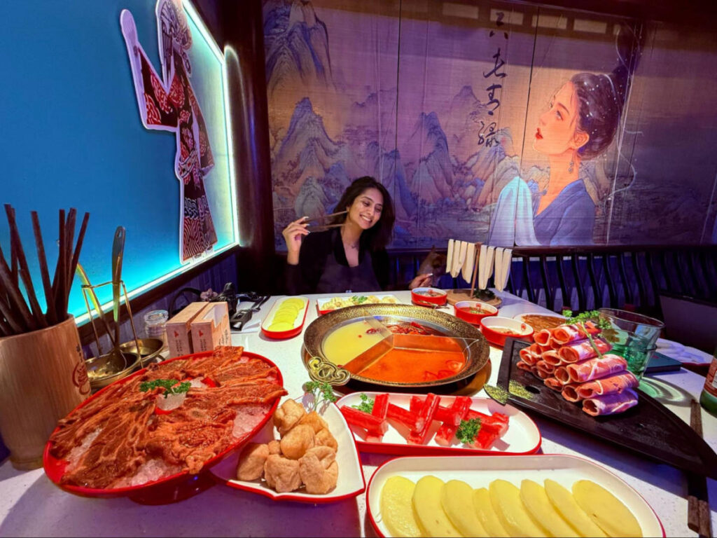 Author Meera enjoying the hot pot spread at In Town