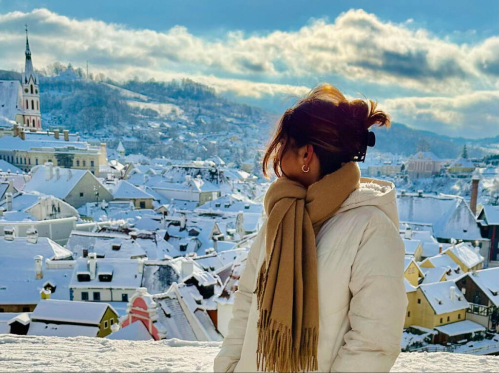 Author Meera looking at Inner Town from the Cloak Bridge during winter