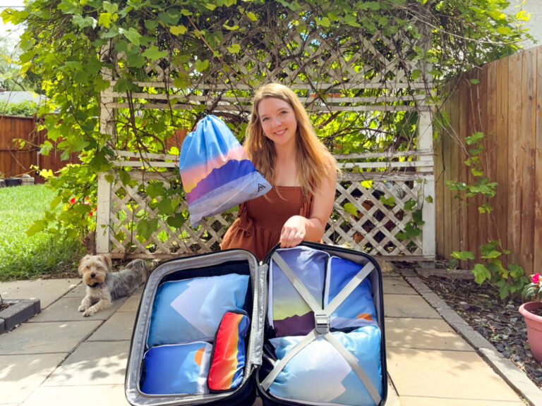 Author Taylor showing her packing cubes