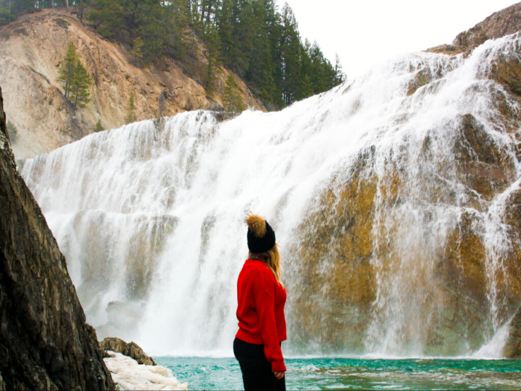 Author Taylor looking at the Wapta Falls in Yoho National park