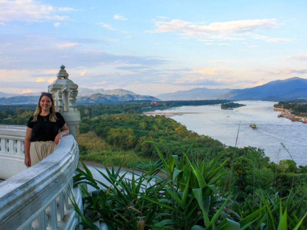 Author Taylor standing at a viewpoint at the Thailand-Myanmar-Laos Golden Triangle