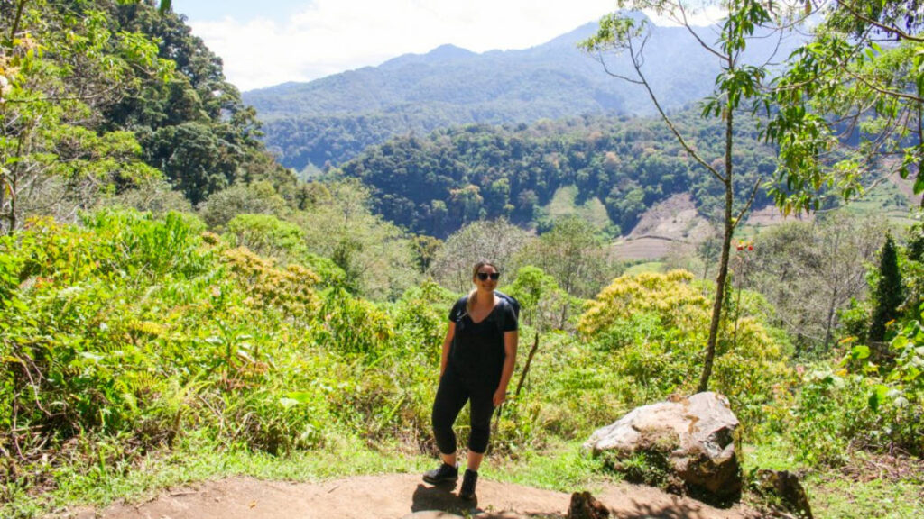 Author Taylor surrounded by greenery while hiking in Panama