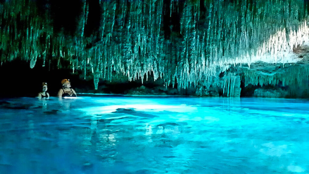 The Author Taylor and her friend in a cave