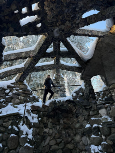 Author Thom standing at the Glehn Castle ruins