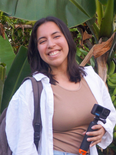 Author Vanessa holding a GoPro HERO 10