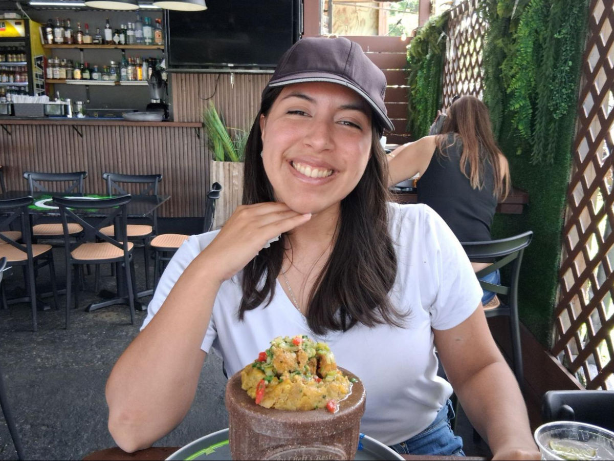 Author Vanessa eating mofongo