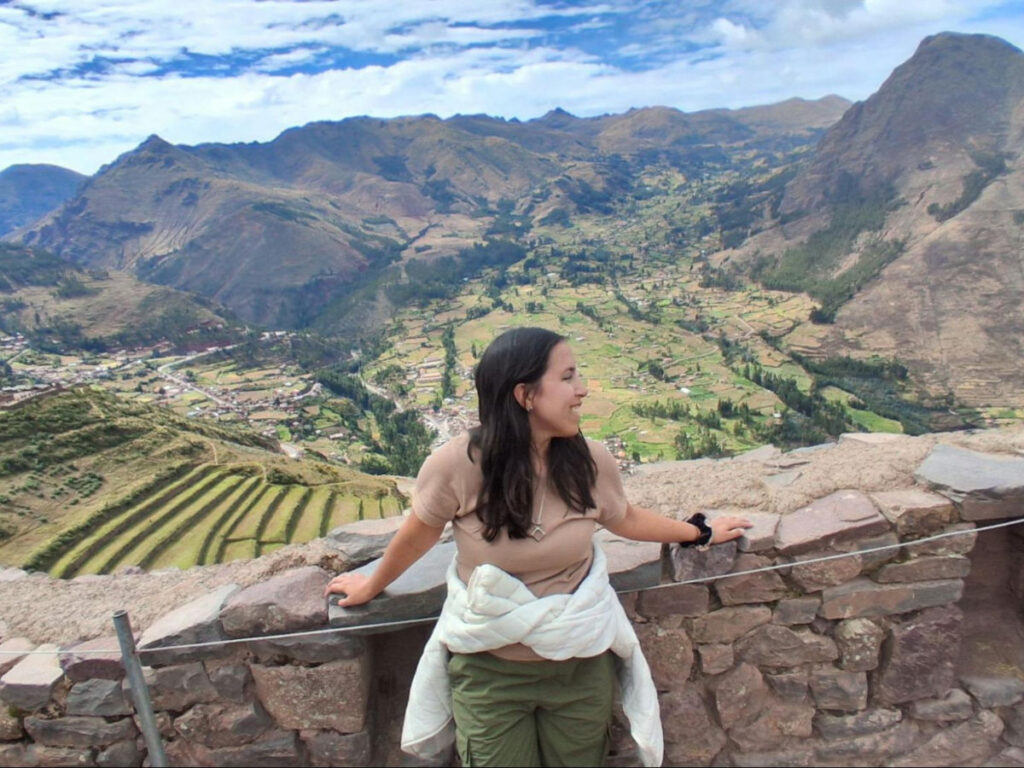Author Vanessa at a viewpoint overlooking the Sacred Valley in Peru