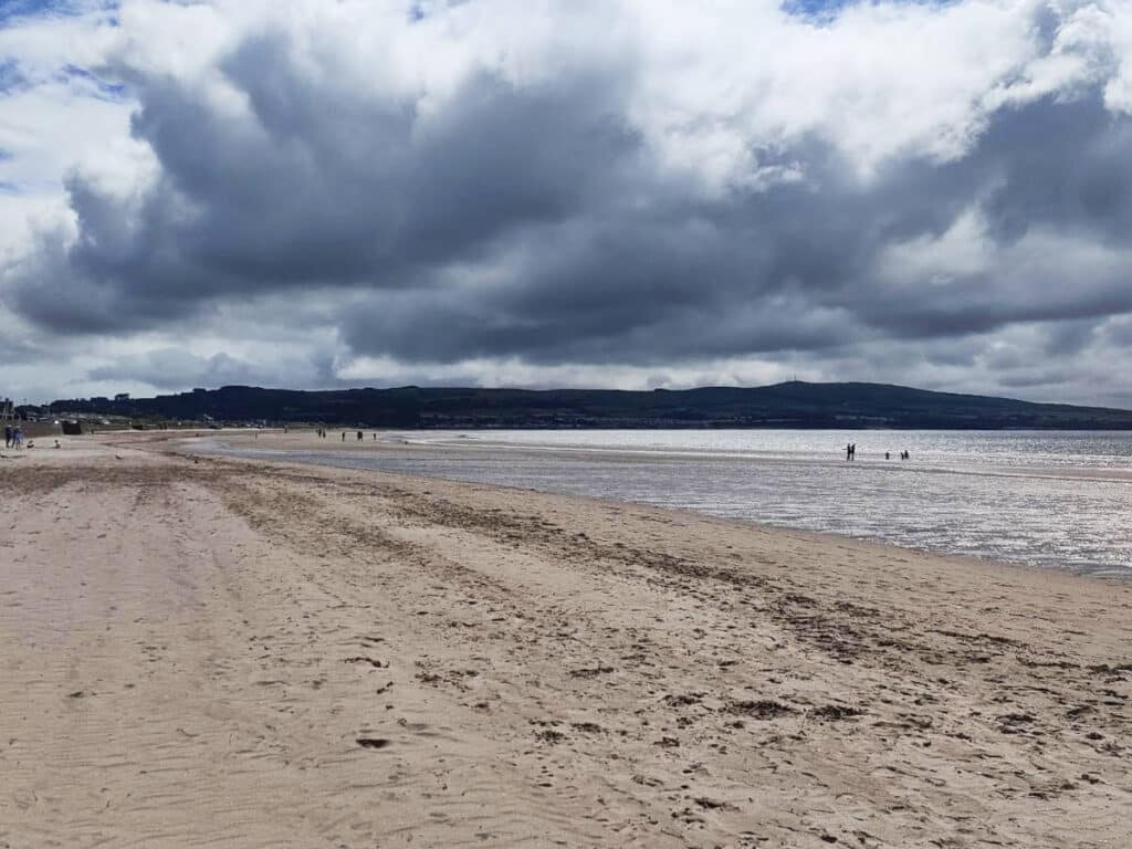 People enjoying their day at the Ayr’s long beach