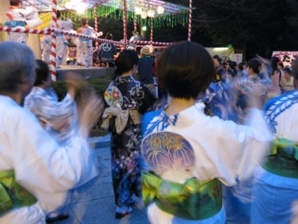 Locals and performers dancing the Bon Odori