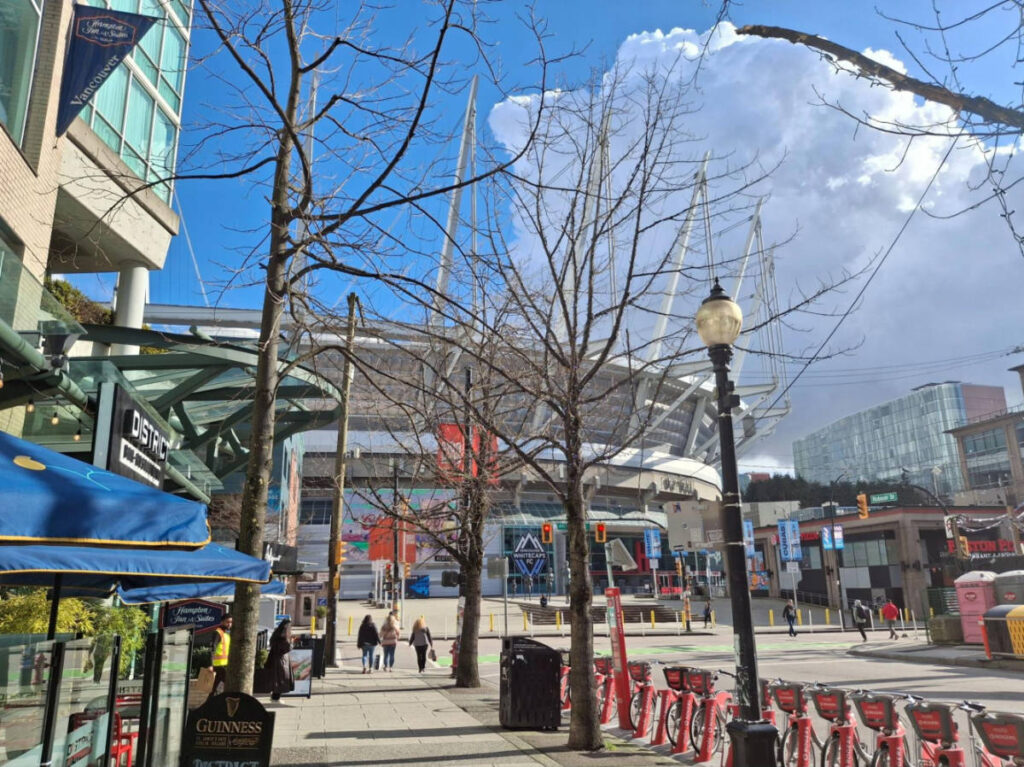 View of the BC Place and Robson Street on a sunny day
