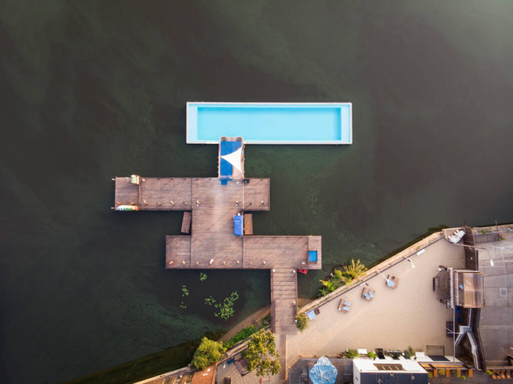 Aerial view of the Badeschiff pool floating on the Spree