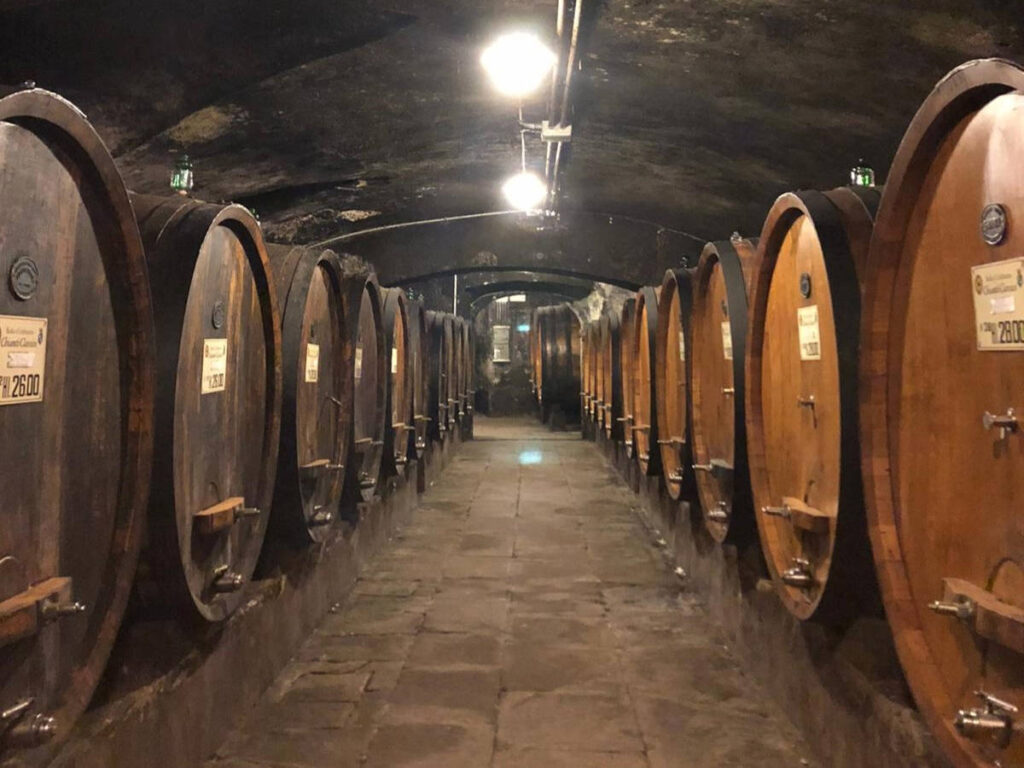 View of the huge barrels in Badia a Coltibuono wine cellar