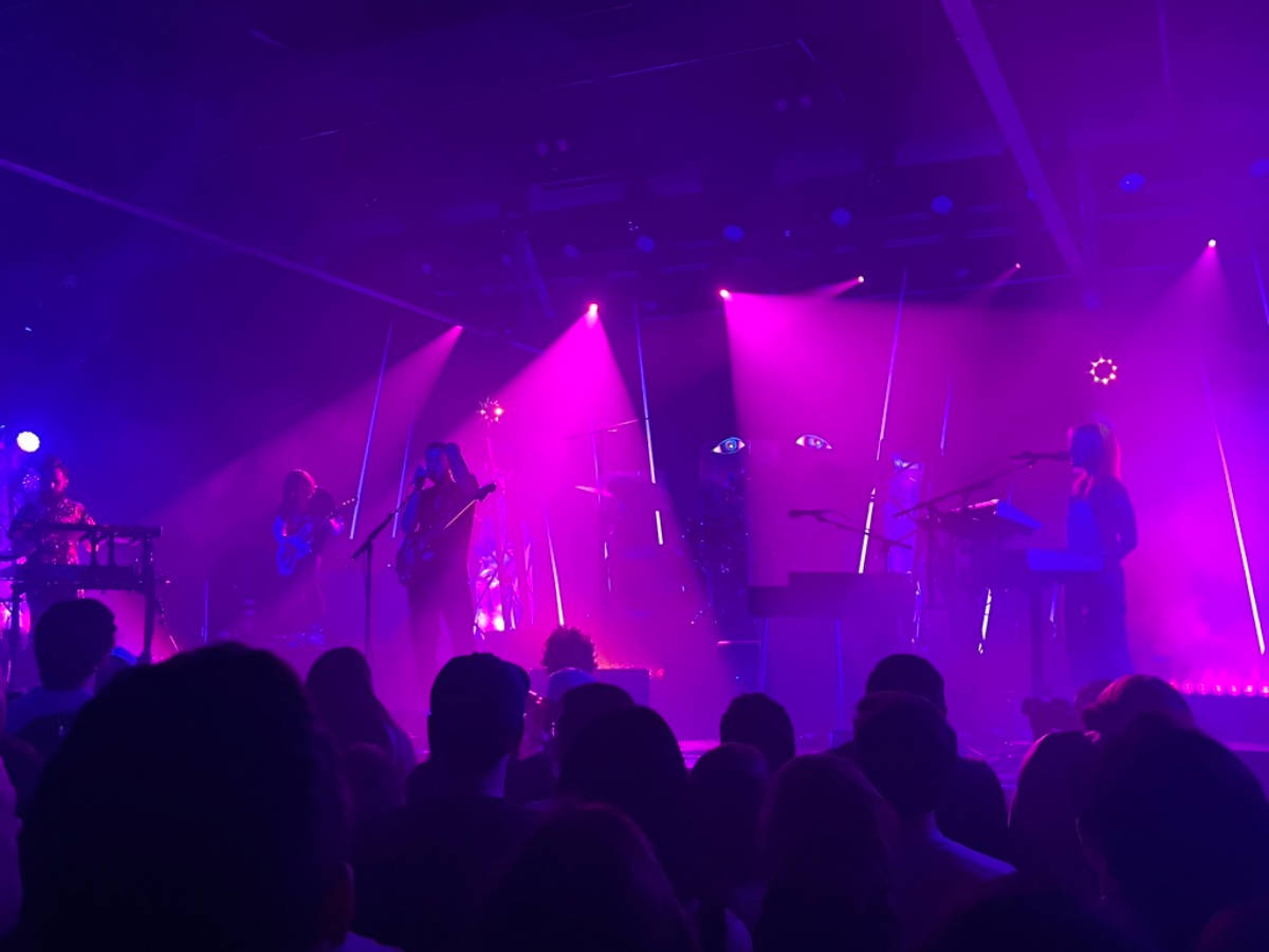 A band performing on the stage