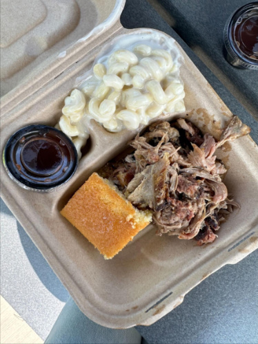 Barbecue, macaroni, and a pastry from a local food truck