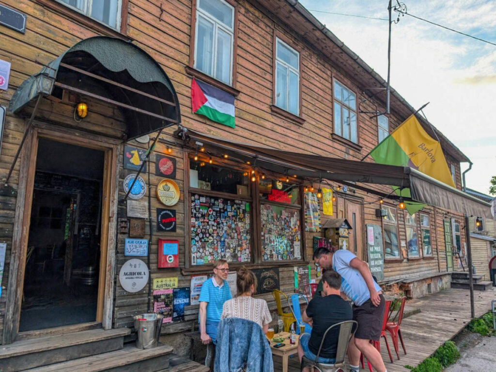 People enjoying outside a community bar in Barlova