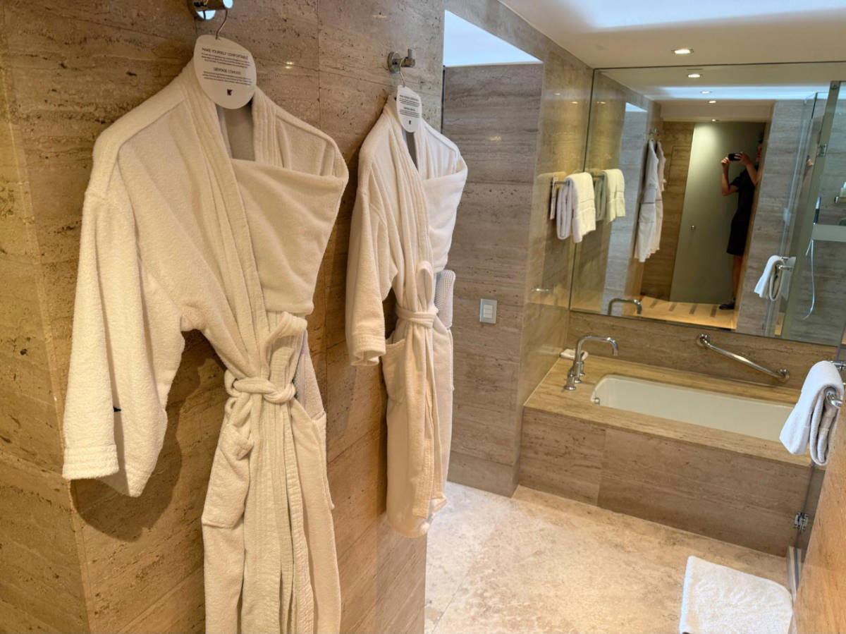 Robes hanging inside the bathroom in JW Marriott El Convento Cusco
