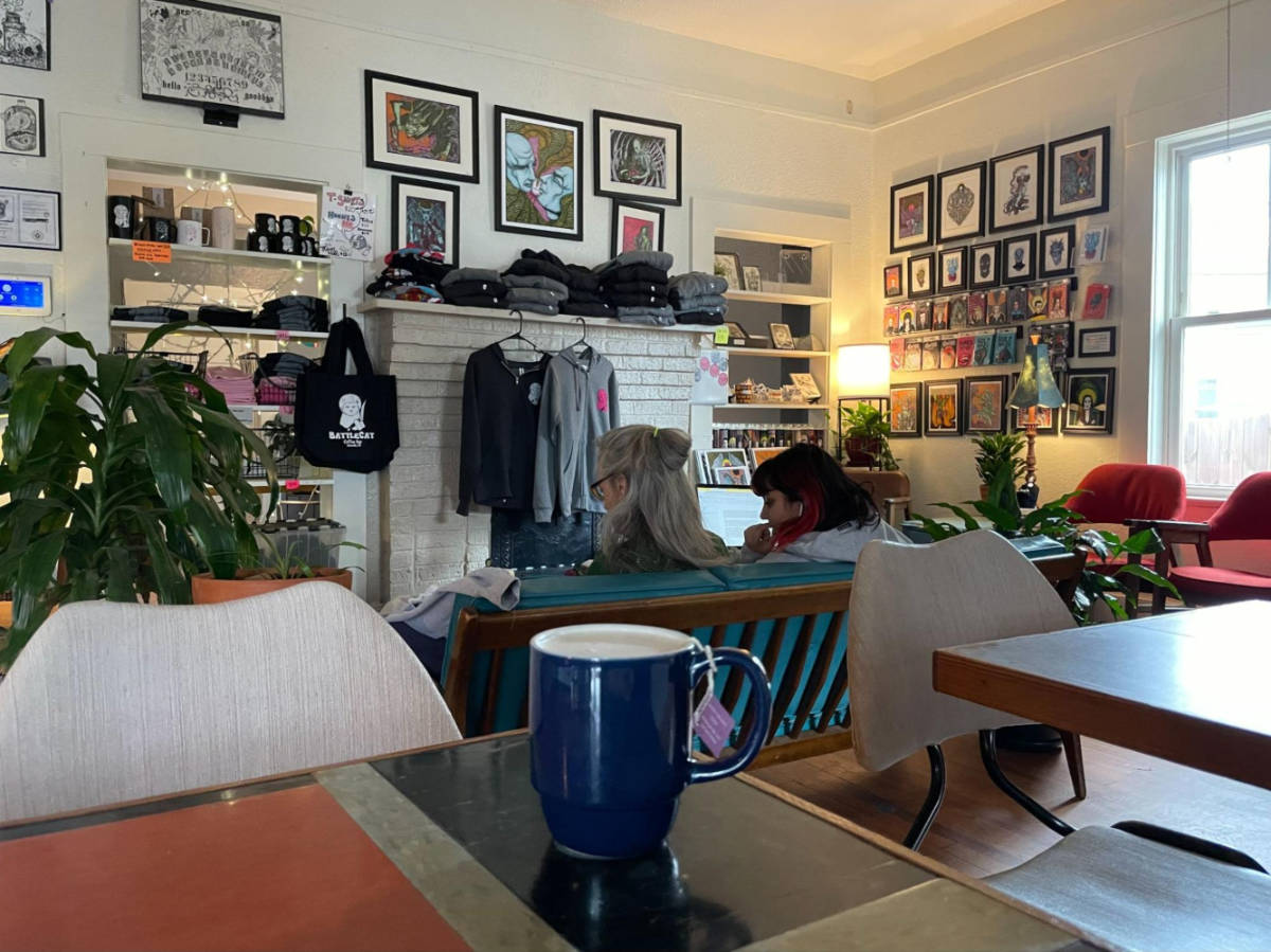 People chilling on the sofa with cozy interior in BattleCat Coffee Bar in West Asheville