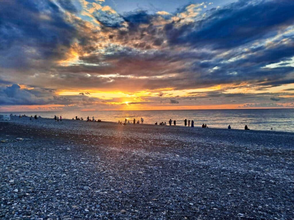 View of the people watching the sunset over the Batumi Beach