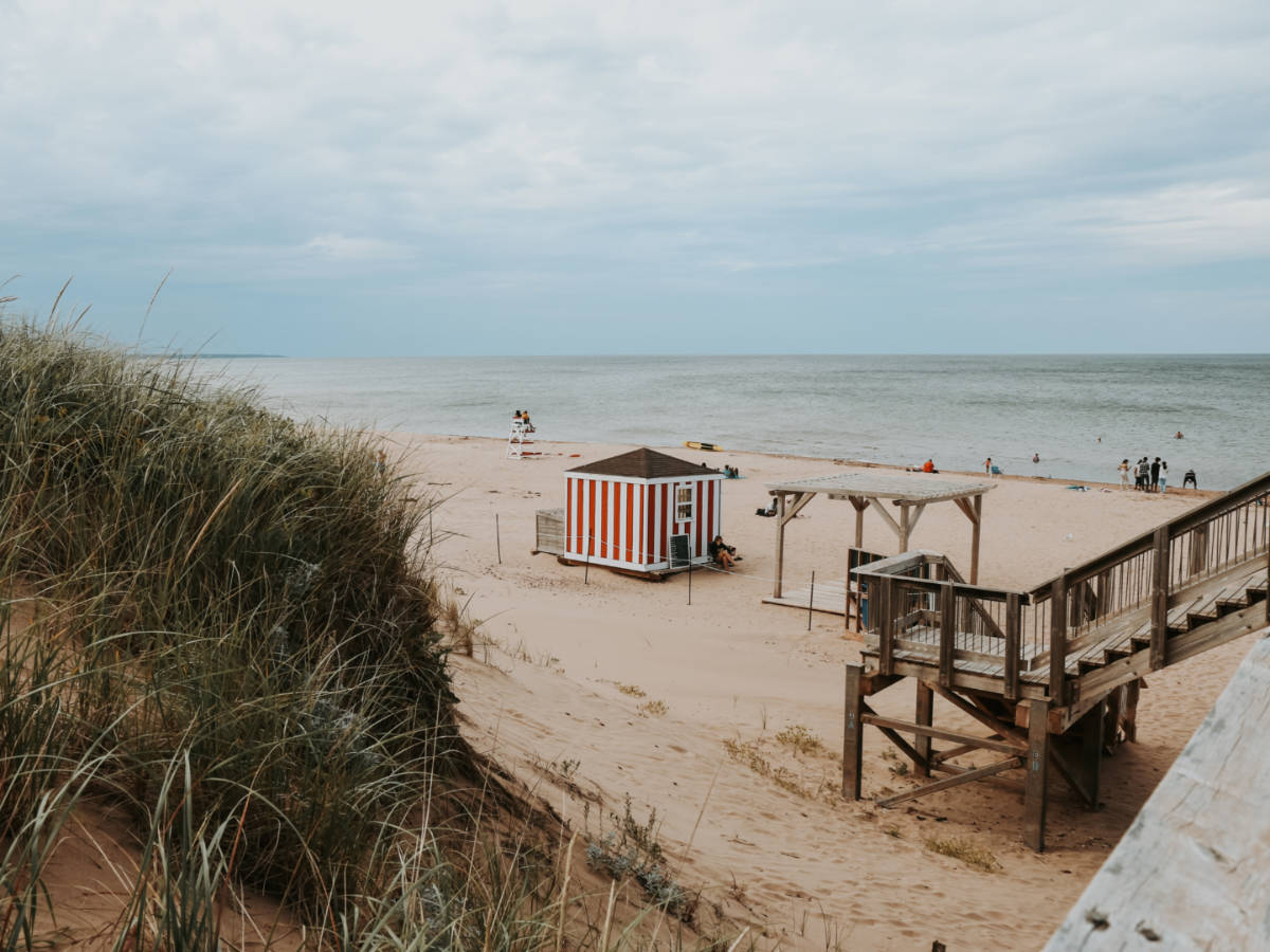 The candy cane beach huts at Cavendish Beach
