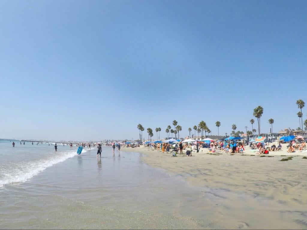 View of the crowded beach in Newport Beach