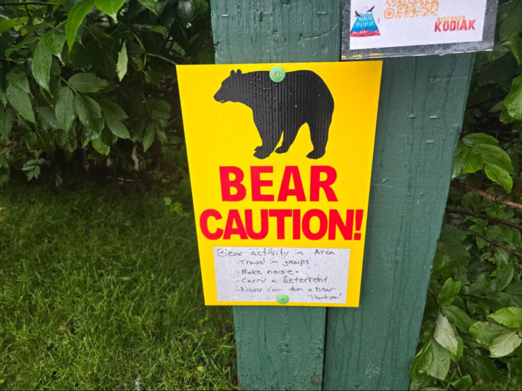 A warning sign of recent bear sightings on a trail in Kodiak
