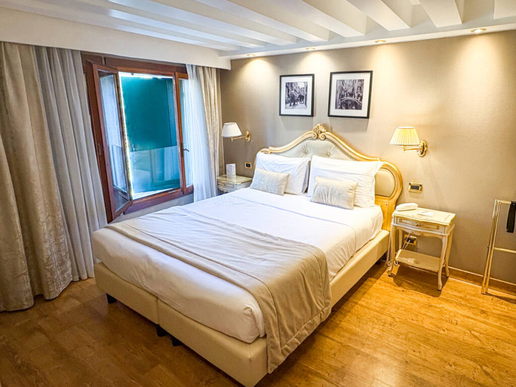 View of the bedroom at Hotel Olimpia
