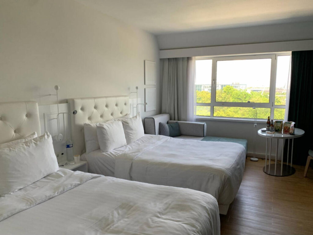 View of beds from a hotel room