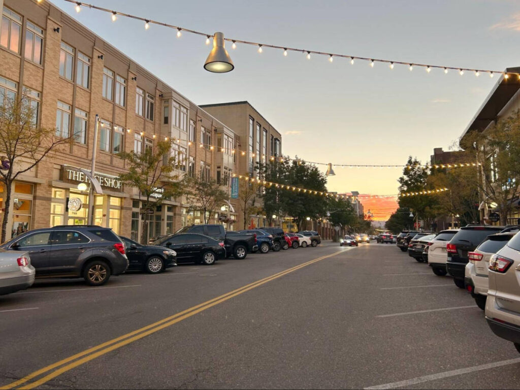 View of the shops and restaurants around Belmar at sunset