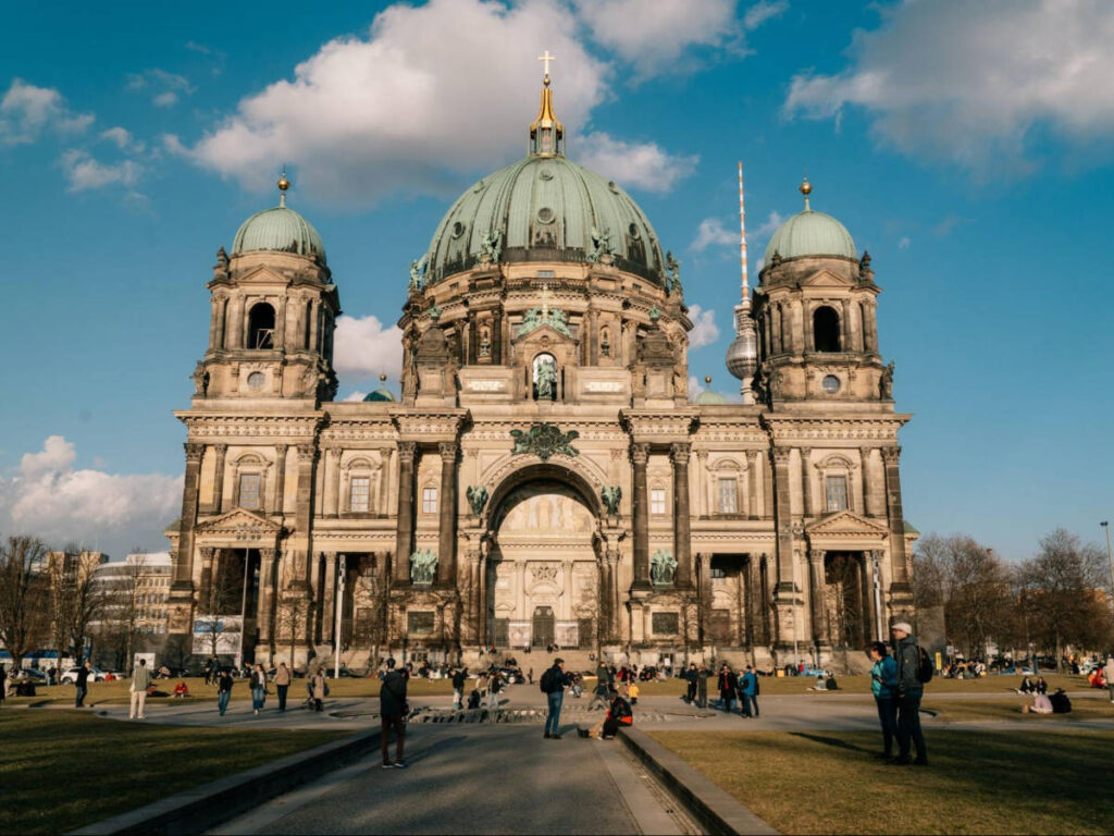 Tourists enjoying in front of the Berliner Dom on a sunny day