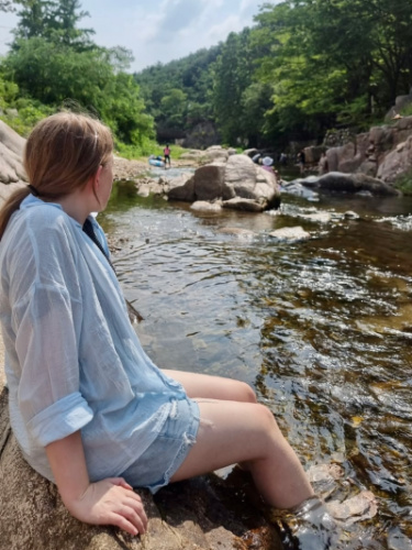 The author Bethan Nutting, enjoying the water at the Bukhansan National Park