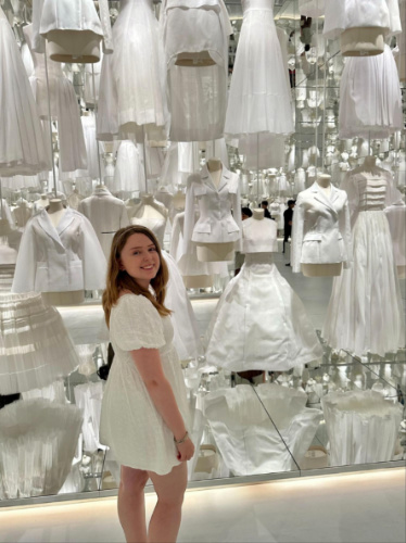 The author Bethan Nutting, looking at the Christian Dior exhibit at the Dongdaemun Design Plaza
