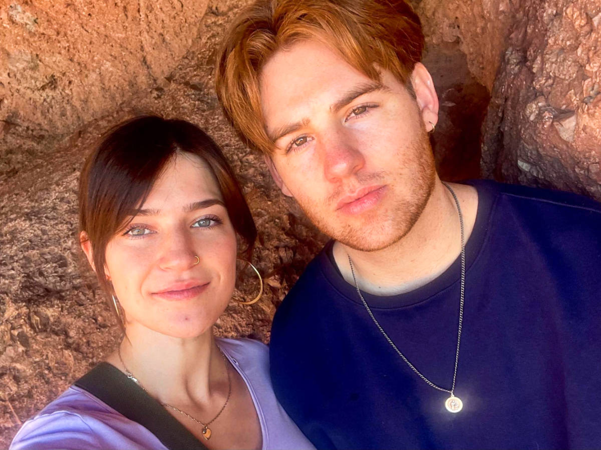 The author Betty Hurd and her boyfriend, smiling for a photo at Papago Park