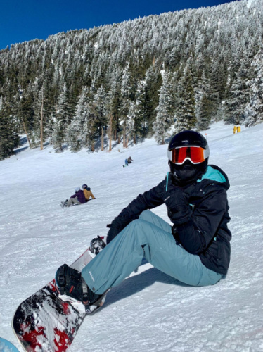 The author Betty Hurd snowboarding in Flagstaff