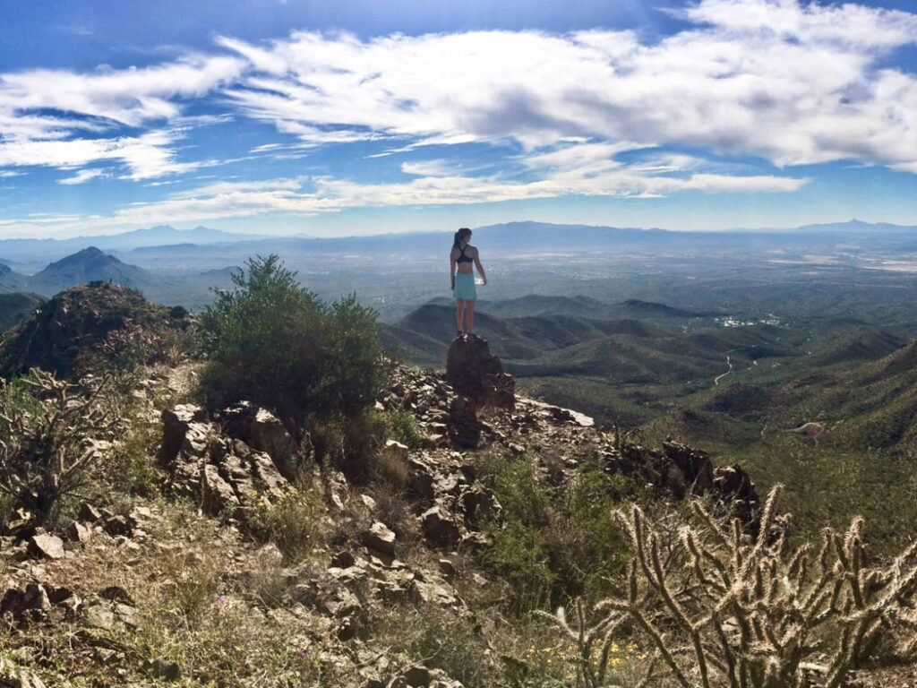 Travel Lemming Writer, Betty Hurd, admiring the Tucson views from Wasson Peak