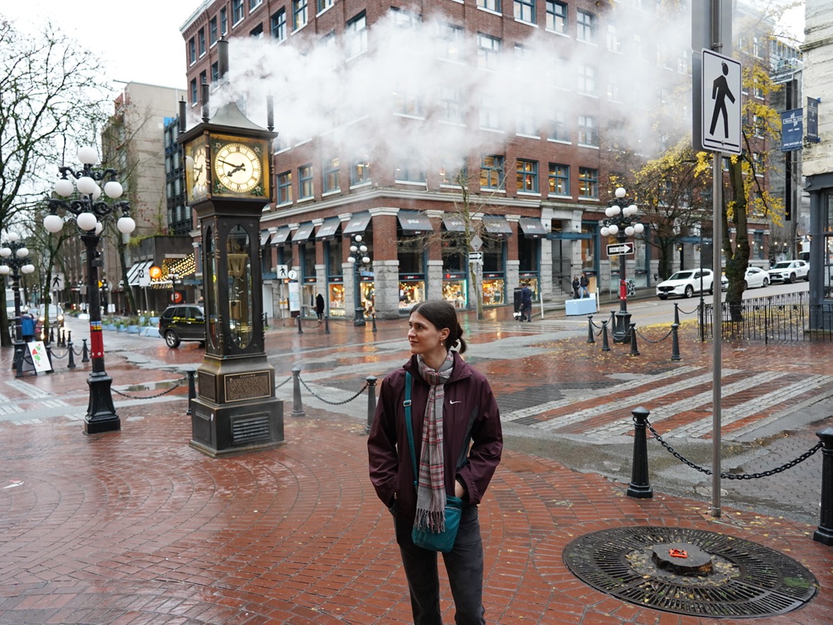 Travel Lemming writer Betty Hurd, standing in front of the steam clock in Gastown