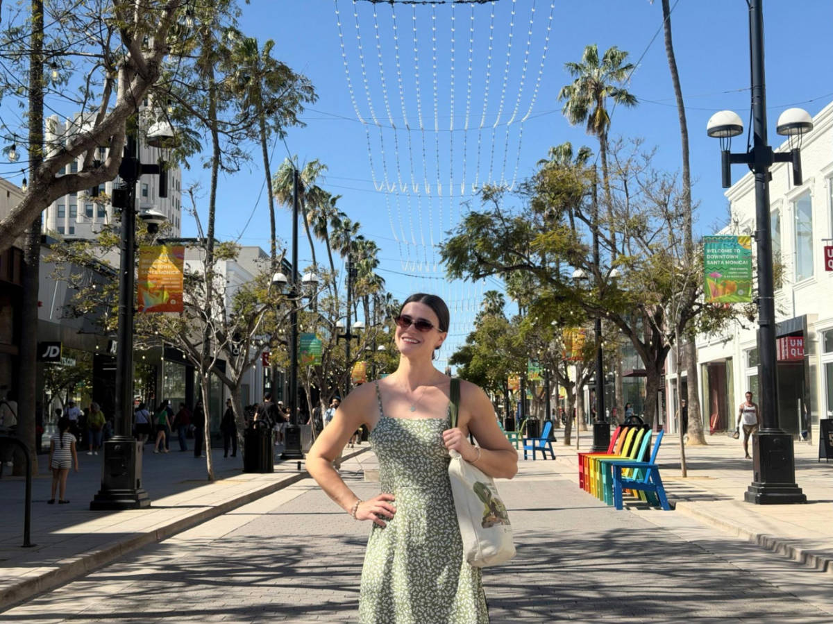 Travel Lemming writer, Betty Hurd, posing for a photo in the middle of the Third Street Promenade