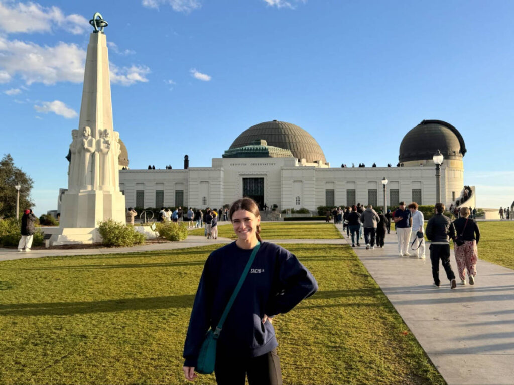 Travel Lemming writer, Betty Hurd, standing in front of the Griffith Observatory