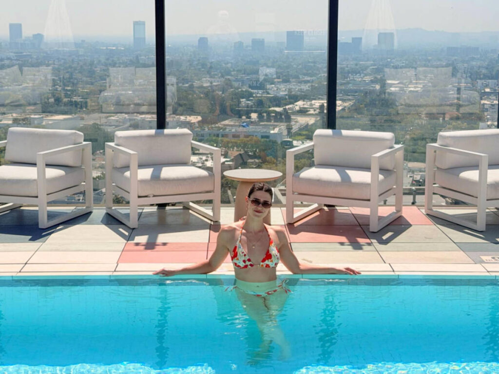 The author Betty Hurd, enjoying the rooftop pool in the Sun Rose