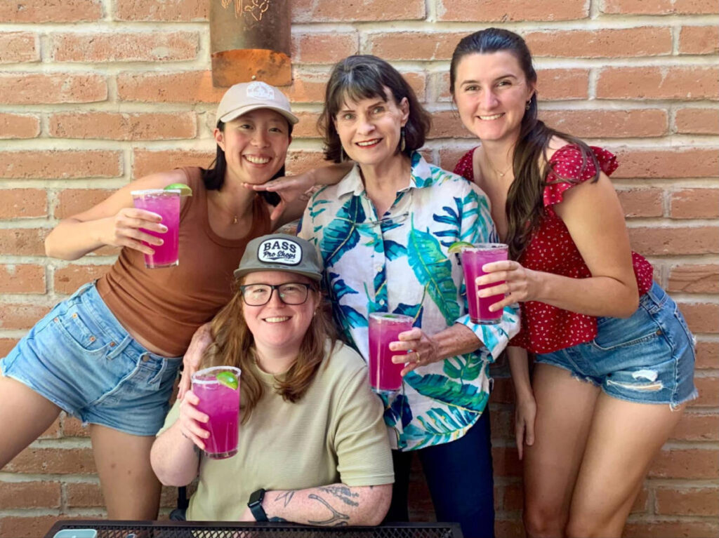 The author's mom and friends enjoying their glasses of prickly pear margaritas