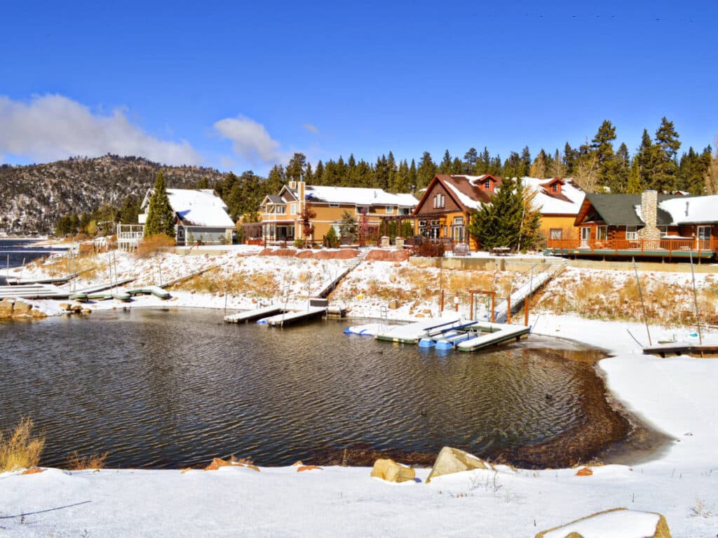 View of the cabins from across the lake in Big Bear during winter