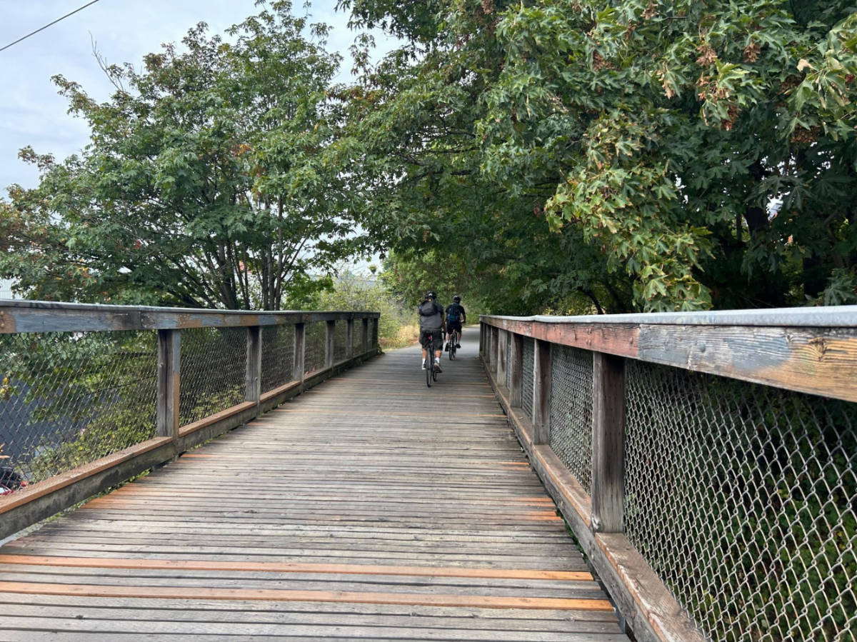The bikers riding along the Burke Gilman Trail
